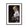 A fine art photo of Dolly Parton singing, with a close-up on her performing. Shot by Mick Rock. 