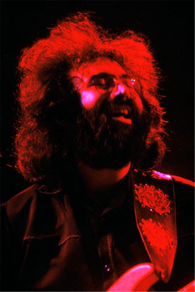 A photograph of Jerry Garcia, lead singer of the Grateful Dead, in 1972, by Mick Rock.