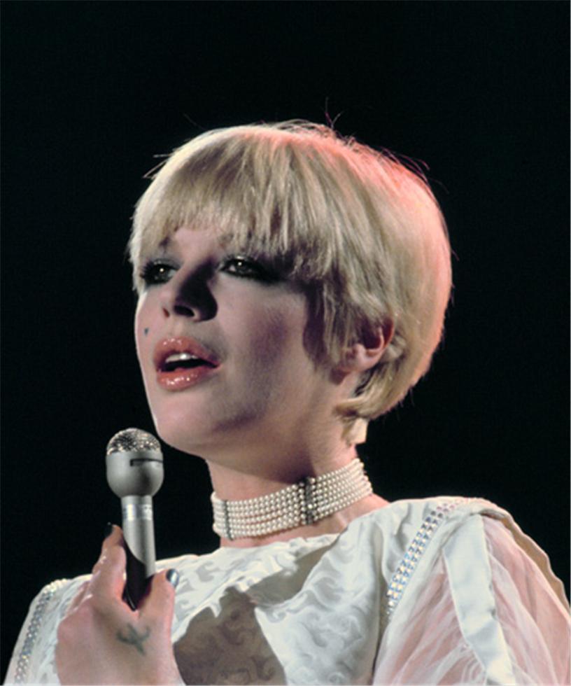 A fine art limited edition photograph of Marianne Faithfull performing in 1973 shot by mick rock. 
