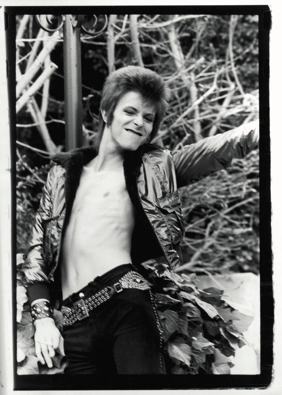 A fine art limited edition black and white photograph of david bowie at the beverly hills hotel in 1977, shot by mick rock. 