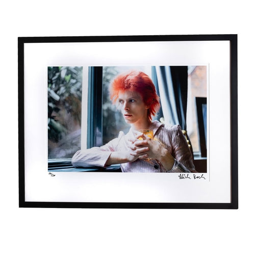 Rare, fine art print of david bowie gazing out a window at Haddon Hall. Photo signed by the photographer Mick Rock. 