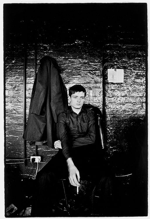 Ian Curtis of Joy Division at rehearsal in 1979, photo captured by Kevin Cummins. 