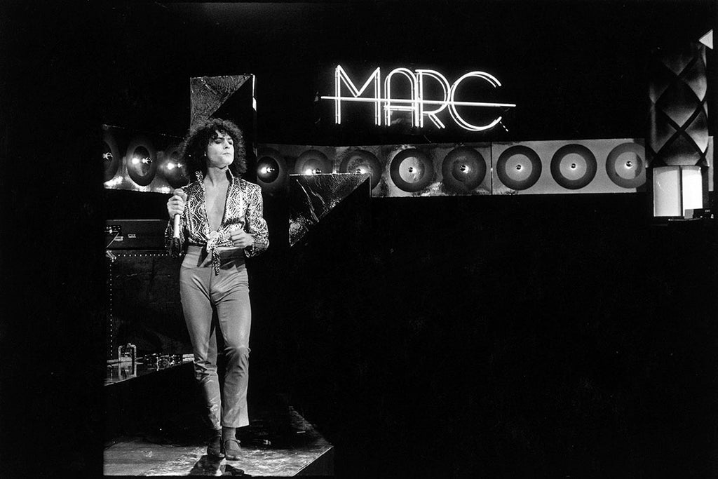 Marc Bolan of T Rex performing in 1977  by Kevin Cummins.