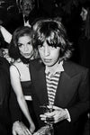A black and white fine art print of Mick and Bianca Jagger out in NYC. Shot by Allan Tannenbaum.
