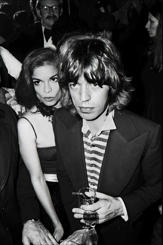 A black and white fine art print of Mick and Bianca Jagger out in NYC. Shot by Allan Tannenbaum.