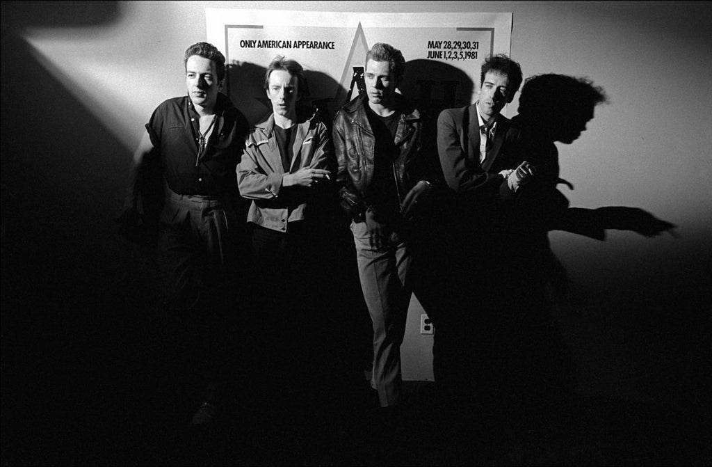 Black and white photograph of The Clash band members shot in 1981 by Allan Tannenbaum.