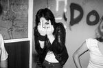 Backstage with Joan Jett, by photographer Brad Elterman, Black and white photo, middle finger, singer, performer, rock star, sunset blvd, Collectors Edition, Limited edition photograph, Rock n roll photography, Fine art photography, wall decor,  home decor, luxury, decor, interior design, home, art, music,  pictures, photography, art gallery La Maison Rebelle, Los Angeles, rock photography. 