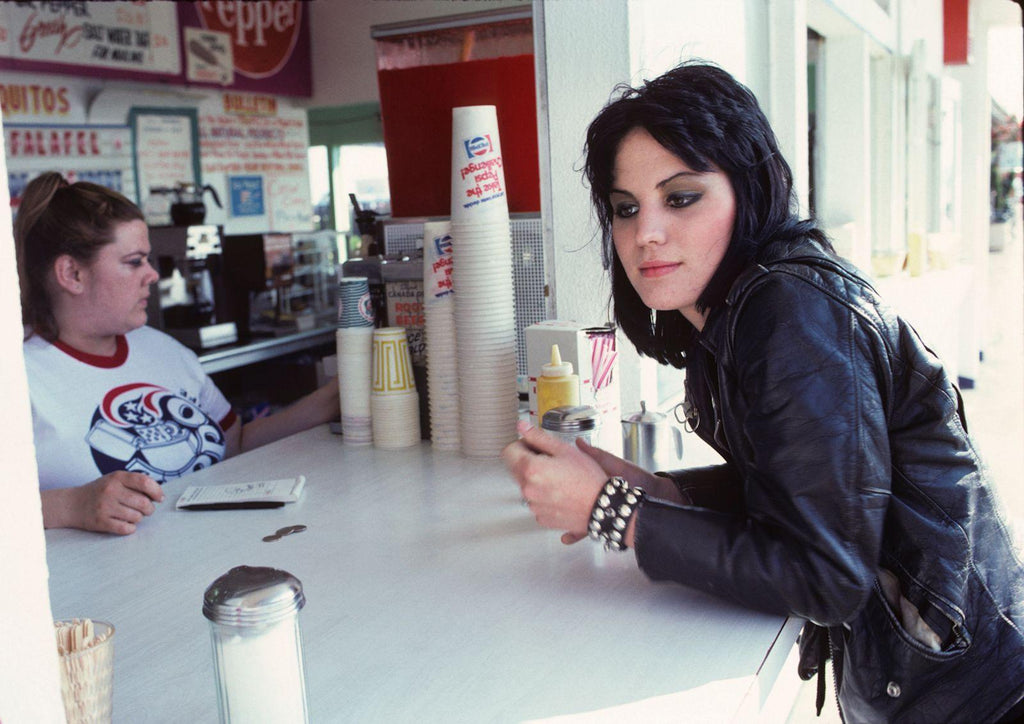Joan Jett at Cafe, about to have a snack, Joan Jett, Hollywood blvd, chinese restaurant, color photo, by Brad Elterman, signed edition, limited edition, coffee table book, fine art photography, rock n roll, Los Angeles, Joan Jett, blondie, Debbie Harry, Ramones, David Bowie, kiss, Michael Jackson, iggy pop, sunset Blvd, art gallery, la Maison rebelle. 