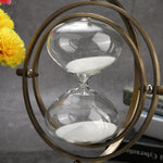 gold, rotating, hourglass, sculpture, sand timer, 15 minute, la maison rebelle, home decor, art gallery, gift shop